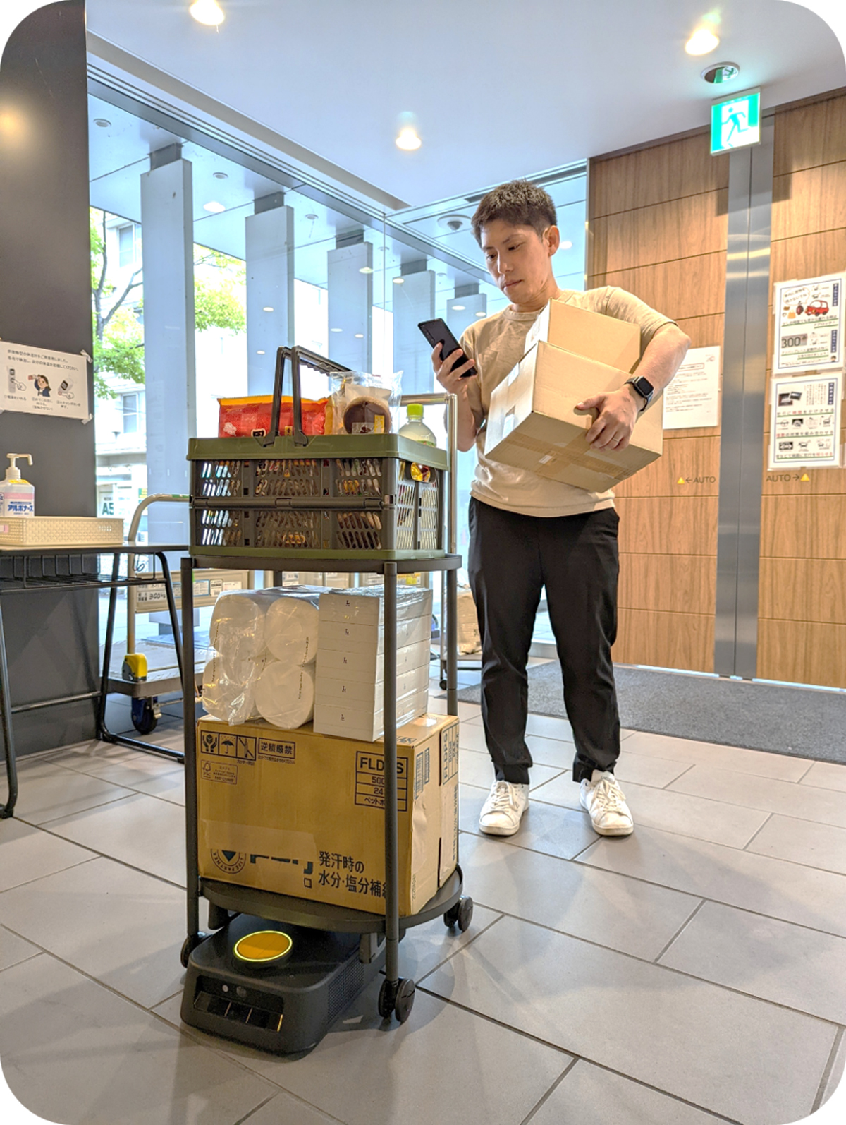 三菱電機ビルソリューションズほか/エレベーターとロボット連携の荷物搬送実験 20251210mi01 - 三菱電機ビルソリューションズほか/エレベーターとロボット連携の荷物搬送実験